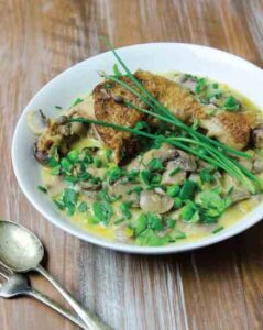 Chicken in Wine with Mushrooms, Peas, and Herbs Recipe